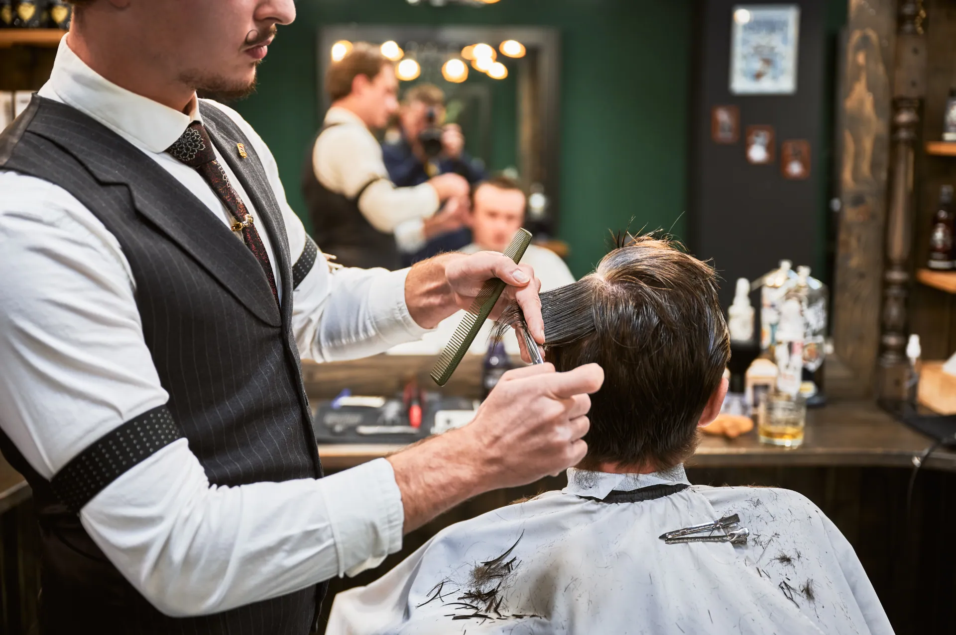 Barber at work at Blade & Co.